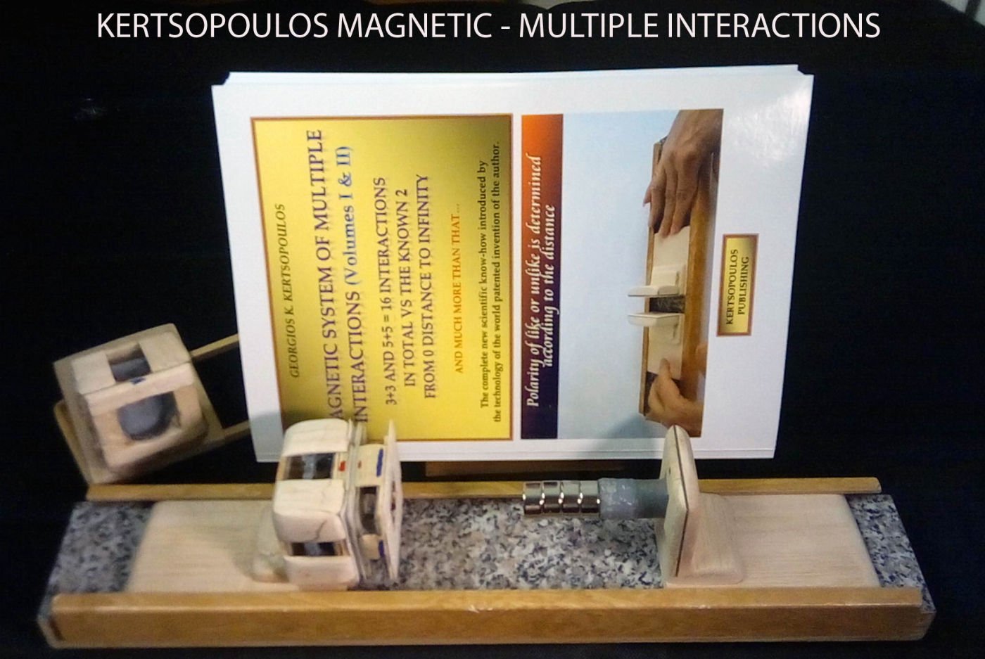 PHOTO OF MAGNETIC DEVICE WITH BOOK